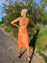 Load image into Gallery viewer, orange satin dress, orange satin midi dress, sunset orange satin dress, orange wedding guest dress, orange strappy satin dress
